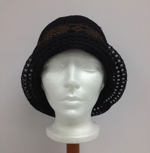 The hat sits quite low on the head, but the turned-up brim allows the face to be seen easily.