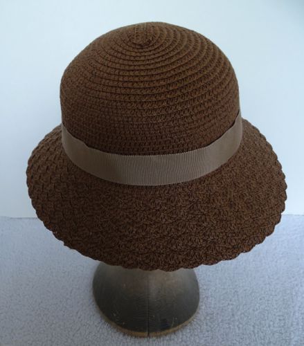 This straw cloche was made for the pilot of the TV series Damnation in 2016.  The braided straw band is fancy enough to allow for a very simple hat band of petersham ribbon.