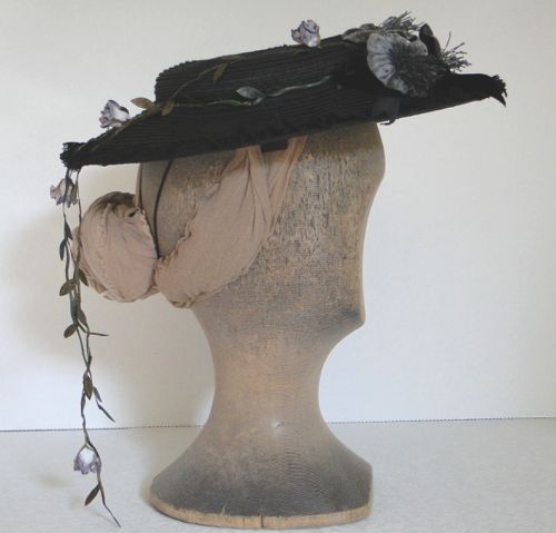 This hat is made of “paper straw” with a buckram and wire reinforcement in the crown, and a completely hidden wire around the outer edge.