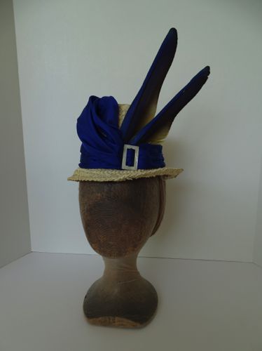 The crown of the hat was hand blocked over a wooden block and the brim was shaped by hand.