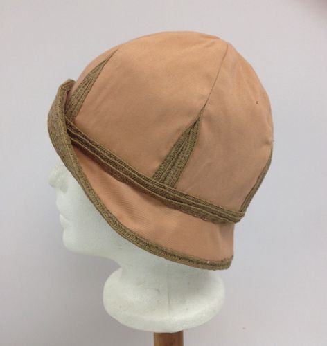 Intended to be worn with the brim turned up, the straw on the crown was machine stitched to resemble the Empire State Building.