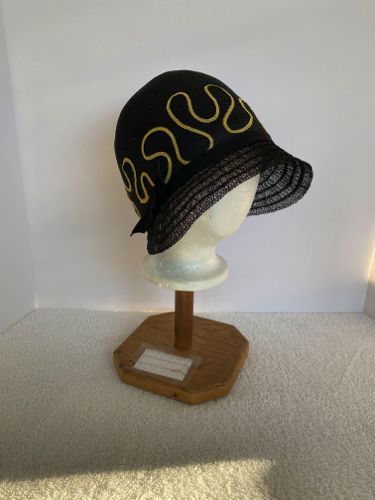 This 1920's style cloche was made from repurposed and vintage materials in 2020.