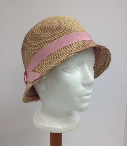 The front brim was shortened to reveal the actresses face!