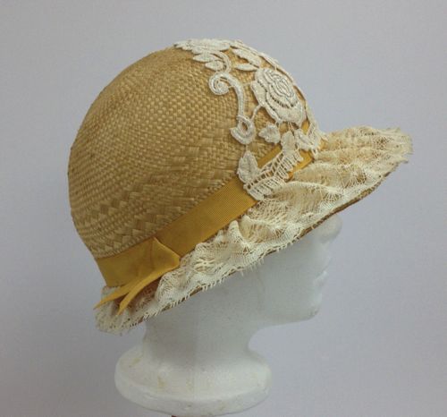 The brim was covered with ecru lace and a petersham band was used to hide the raw edges of the lace.