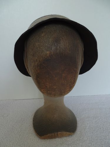 The brim was cut down and hand shaped with steam after the felt dried.