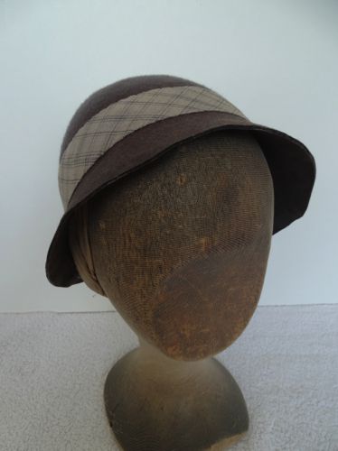 This small brown felt cloche was made from an old cowboy hat!