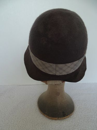 The brim was cut close to the neck at the back.