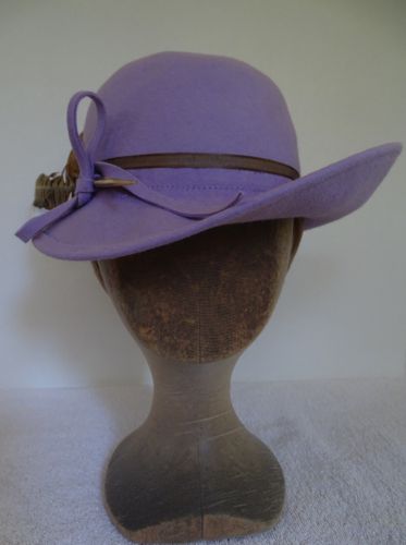 Made for a stage production, this lilac felt hat was a remodel from a different style.