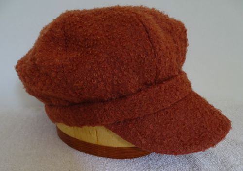 Newsboy cap of rust wool boucle!  Very tactile, and a large size 8, or 25 1/2".  Could be dyed easily.