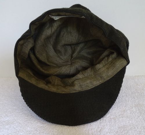 It has been lined with a soft linen fabric in dull green