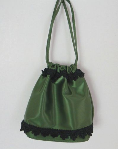 Green satin drawstring purse with dark green gimp trim.  Made for "Hell On Wheels" in 2014.
