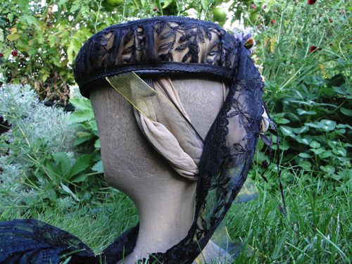 This black and gold hat was made to resemble one found in Harpers Bazar in May of 1868.