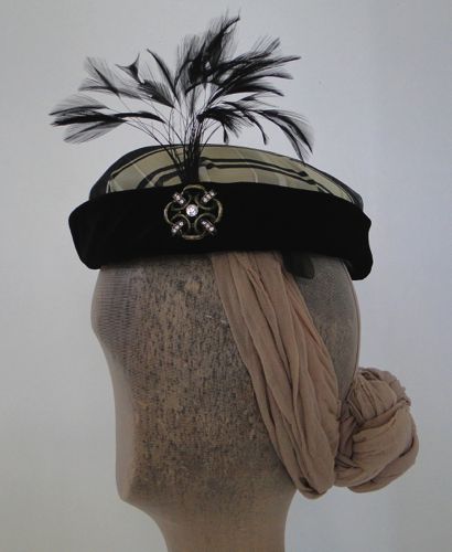Side view of the small toque.  Horsehair tabs are provided for pinning to the hair.