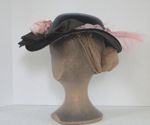 Round Hat made for “Hell On Wheels” 2012.  Buckram frame covered with dark grey velvet.