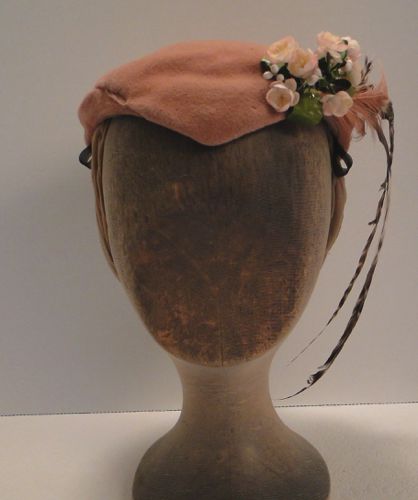This pink felt hat was made to resemble one from Harpers Bazar from April 1868.