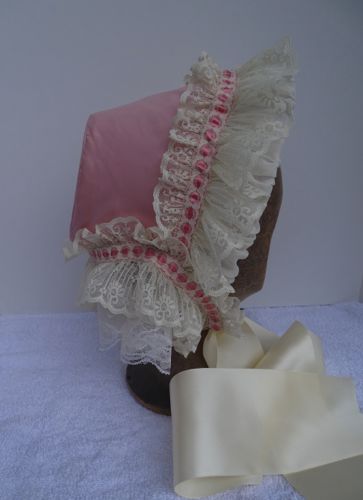 The right side of the bonnet is without flowers, showing the lace off!  The ties are made from wide cream satin ribbon.