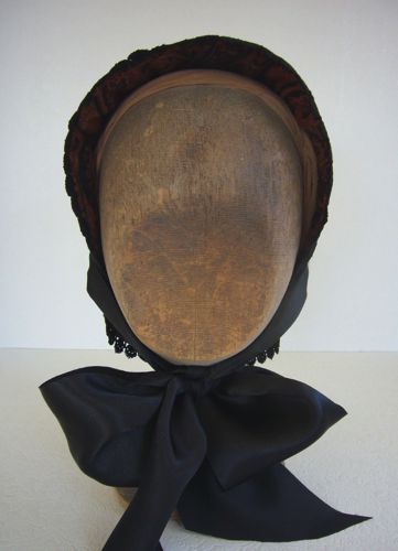 This soft cone-shaped bonnet is made from a paisley fabric chosen by Carol Case, the designer of "Hell On Wheels".