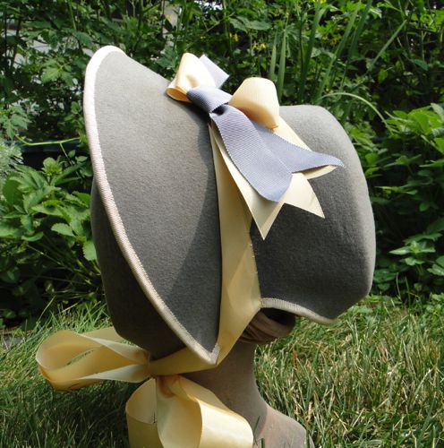 The taffeta ribbon and more grey petersham form the decoration on this bonnet.