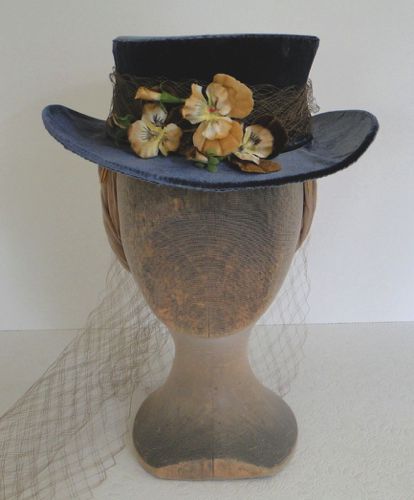This velvet topper trimmed with brown velvet pansies was made in 2014 for the character Anne in “Hell On Wheels”  The velvet is a two-tone blue and brown fabric.