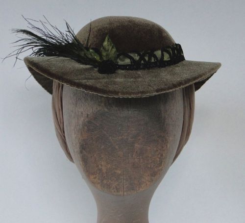 Brown velvet Round Hat with peacock feathers made for “Hell On Wheels” in 2014 has a wire and buckram frame.
