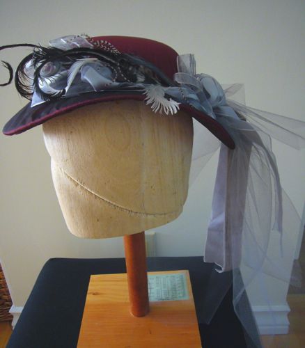 Round Hat made for Virginia Madsen in “Hell On Wheels” 2012 with cockatiel, pheasant and seagull feathers!