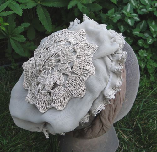 This style of cap would have been worn indoors, at home, during daylight hours. It was popular from the late 1850's to the early 1860's.
