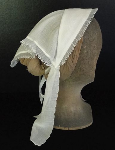 This delicate lawn fanchon day cap was fashioned after one pictured in Godey's Lady's Book in 1864.