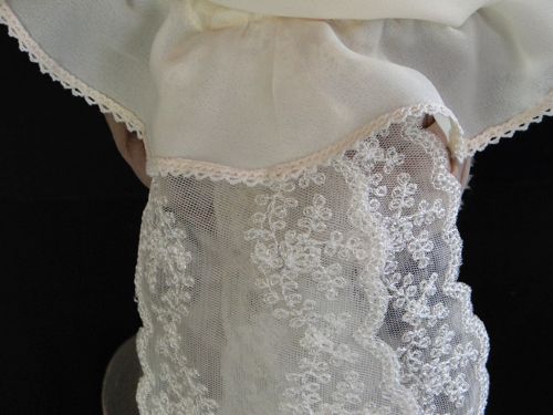 Detail of lace trim and streamers.
