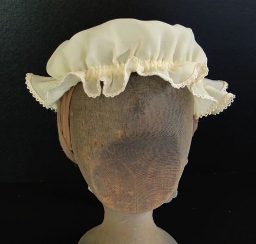 This ivory georgette cap is based on one published in Godey's Ladies Book and Magazine in 1863.