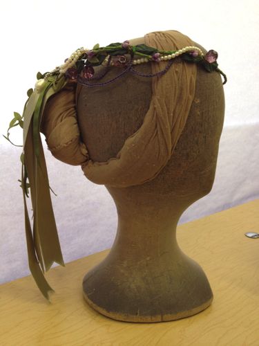 Side back view of the headdress for Virginia Madsen.