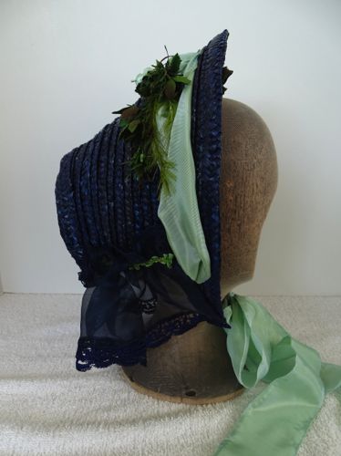This blue straw bonnet was made from re-claimed straw.