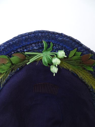 A detail of the trim inside the brim.  The crown is lined with linen and a comb helps keep the bonnet from sliding off the head.