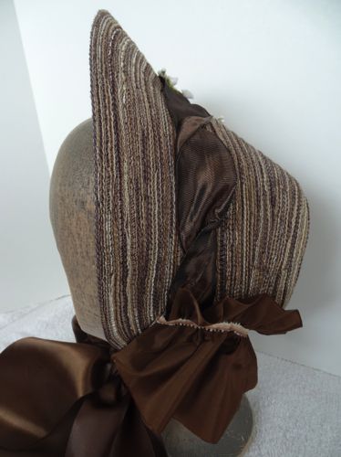 The left side of this bonnet is adorned simply with the twisted taffeta ribbon.  The side view shows the curtain and the ombre picot ribbon that trims it's header.