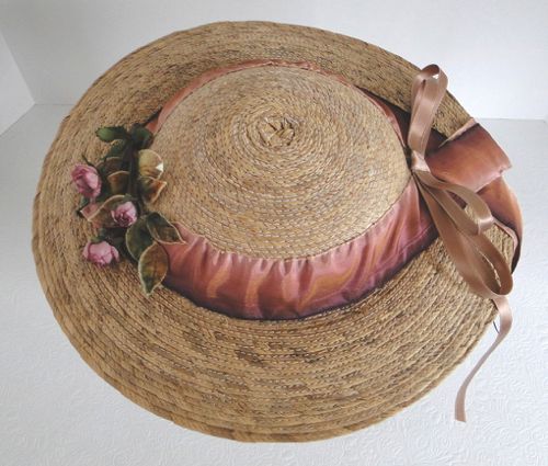 Top-down view of the straw round hat.