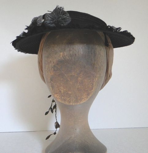 Black Straw hat with shallow crown based on a design from Harper’s Bazar August 1869.