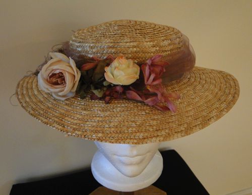 “Leghorn” Straw made for “Hell On Wheels” 2012 trimmed with roses and pink tulle.
