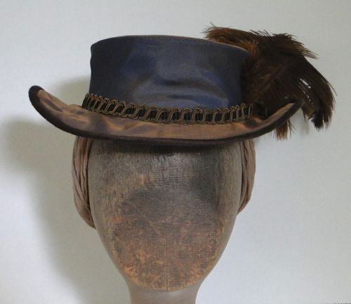 Riding hat made for “Hell On Wheels” 2013.  Frame of Fosshape and millinery wire, covered with shot taffeta.