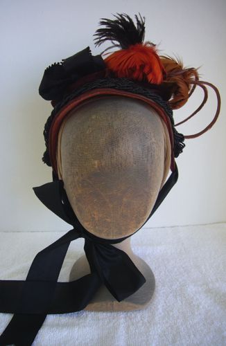 This bonnet was covered with a shot velvet in rust tones and the ties are of vintage black silk taffeta.