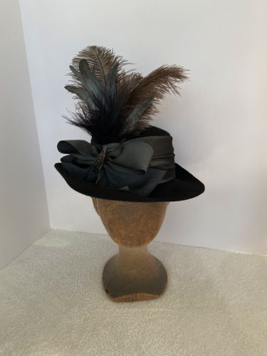The felt was blocked into a flat-crown shape, with a slightly swooped brim.