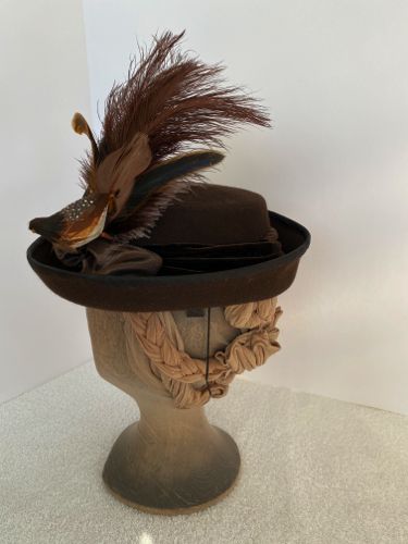 Styled from an illustration circa 1883, this hat was also blocked with a flat-topped crown of moderate height.