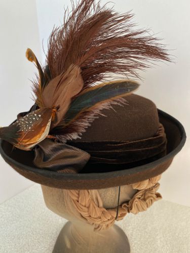 The bird's tail was augmented with additional feathers; rooster tails and hand-dyed ostrich.
