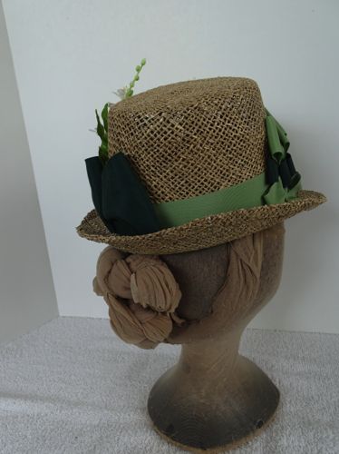 The back right side of the hat is left without adornment to provide some relief for the eye.